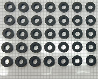 Adhesive-backed silicone pad