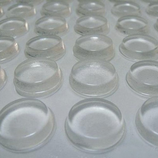 Glue-backed foot pads